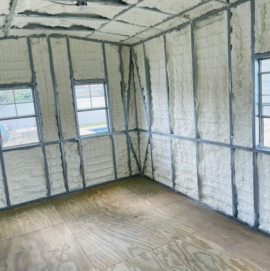 Closed-cell spray foam insulation applied to wall cavities in a residential project in Airmont